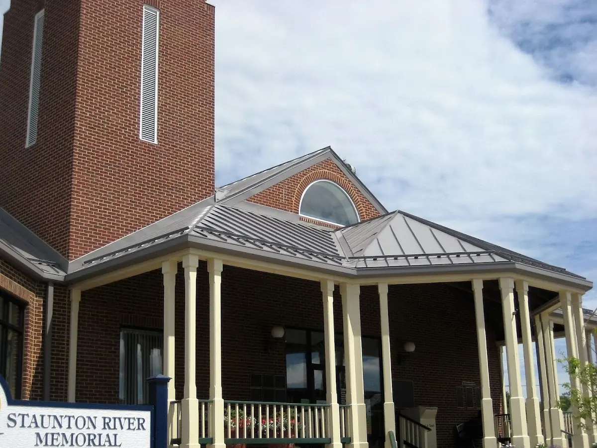 Skilled roofing craftsmen working on a residential roof in Temple-Beaudry